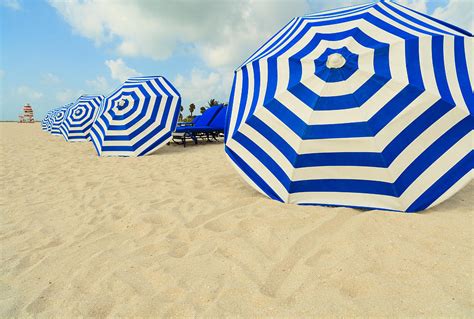 Colorful Beach Umbrellas Photograph by Raul Rodriguez - Fine Art America