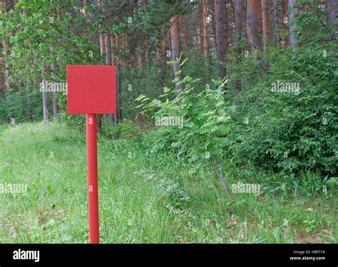 Red metal plate in wood Stock Photo - Alamy