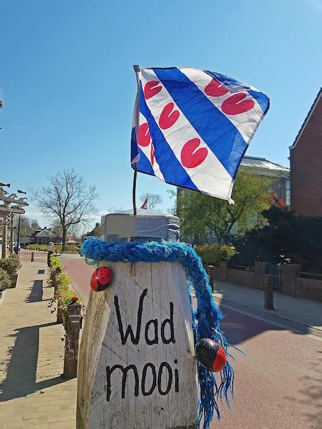 Premium Photo | The frisian flag on a pole with the words wad mooi