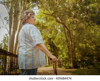 82,351 Elderly Woman Walking Images, Stock Photos & Vectors | Shutterstock