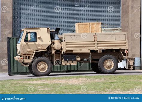 Tan Military Utility and Troop Carrier Diesel Vehicle Editorial Image ...