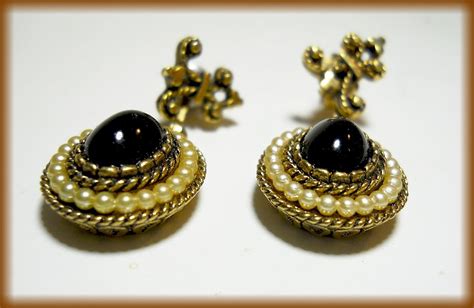 1970's - AVON EARRINGS - Dangle with Fleur-de-lis | Collectors Weekly