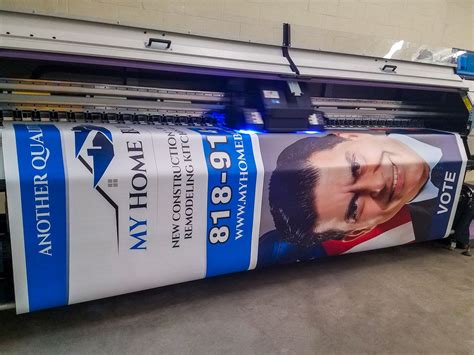 Big banner printing process for a real estate company | Front Signs