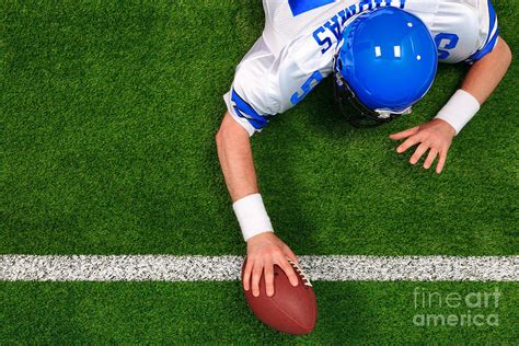 Overhead American football player one handed touchdown Photograph by ...