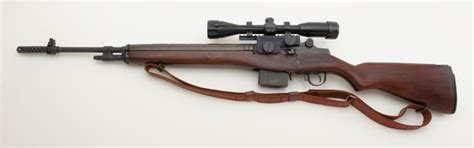 Springfield Armory M1A semi-auto rifle, .30 cal., 22” barrel, military finish, wood stock, leather s