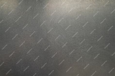 Premium Photo | Scratched metal texture, Brushed steel plate background