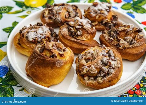 Freshly Baked Buns with Nuts on Colored Towel Top View. Stock Image ...