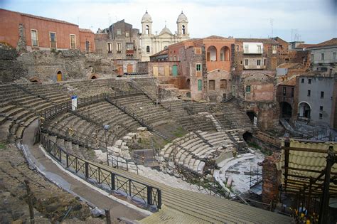 The Church of Saint Francis of Assisi backs the Cavea of the Greek-Roman Theatre in Catania ...