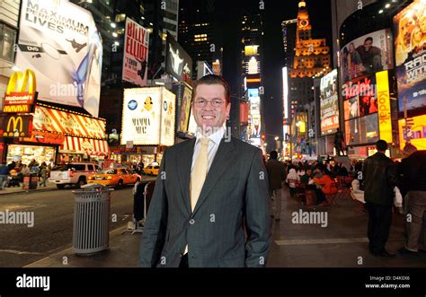 German Economy Minister Karl-Theodor zu Guttenberg seen on Times Square after arriving in New ...