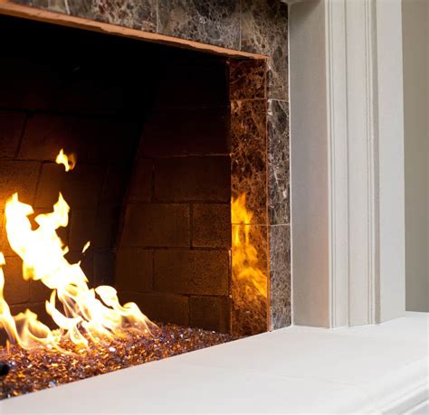 25 Fireplace Decorating Ideas with Gas Logs, Electric Logs, and Glass Rocks
