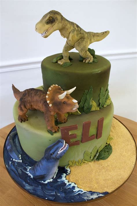 dinosaur tiered cake - Google Search | Dinosaur birthday cakes, Dino ...