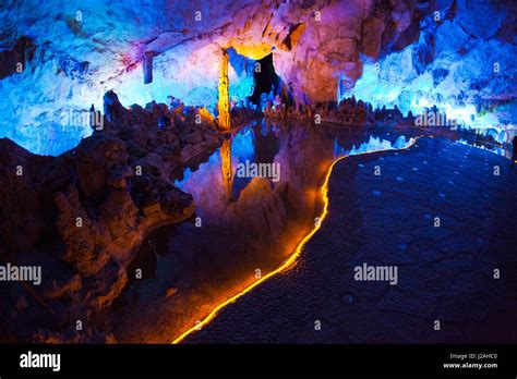 China, Guling, Multi Colored Lights in the Reed Flute Cave Stock Photo - Alamy