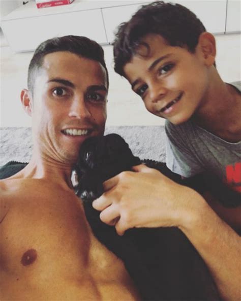 Cristiano Ronaldo shares Instagram photo of son and 'new member' - Photo 1