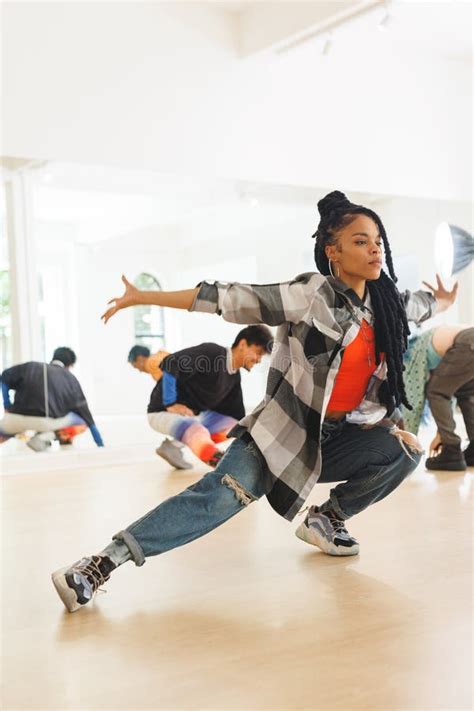 Vertical Image of African American Female Hip Hop Dancer Practicing at ...