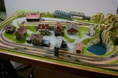 Layouts can be as simple as a 4X8 plywood board. | Model train table, N scale train layout, N ...