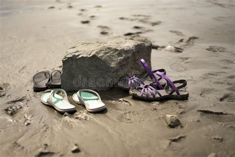 Flip Flops and Sandals on the Beach Stock Image - Image of sunlight ...