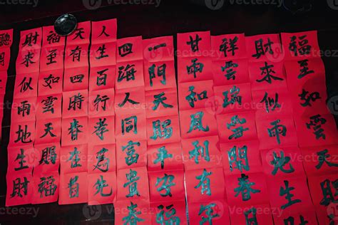 Vietnamese scholar writes calligraphy at Long Son. Calligraphy festival is a popular tradition ...