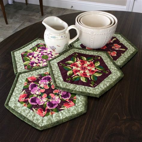 Kaleidoscope Quilted Mug Rugs Set of Four Floral Hexagon | Etsy | Kaleidoscope quilt, Hexagon ...