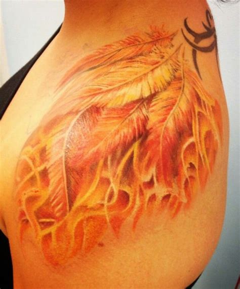 Female shoulder phoenix feather tattoo | Phoenix feather tattoos, Tattoos, Feather tattoo