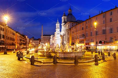 Piazza navona square at night rome italy stock photo containing fountain of | High-Quality ...