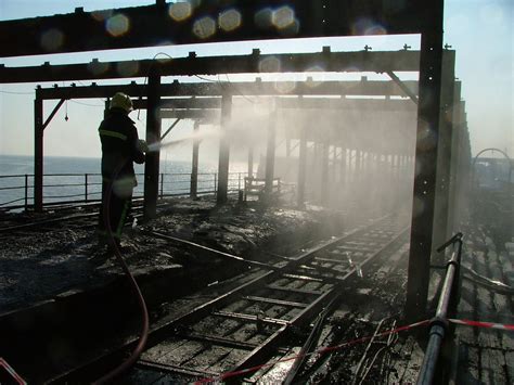 Southend Pier Fire 2005 | A Fire-fighter dampens down the sm… | Flickr