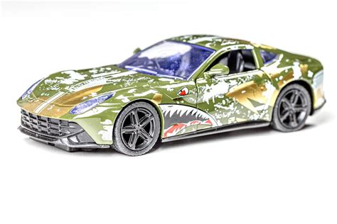 Metal car-toy for children on a white background (Flip 2020) - Creative Commons Bilder