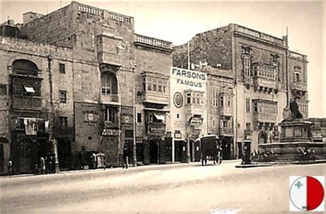 an old black and white photo of buildings