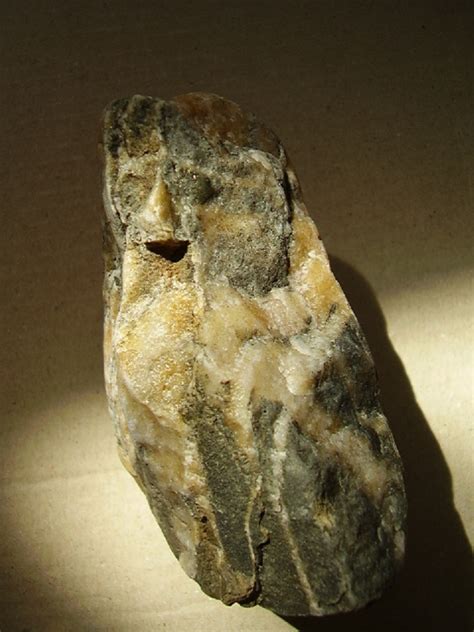 Archaeology of Portable Rock Art: Lower Paleolithic owl sculptures from North Western Europe