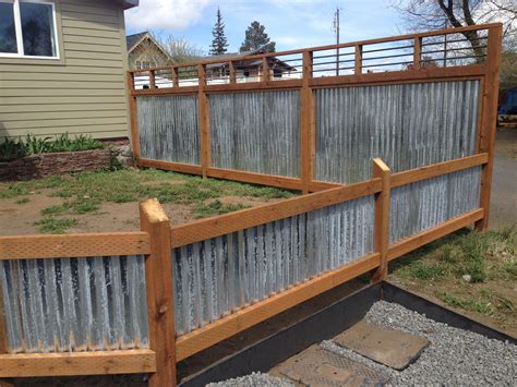Corrugated metal and rebar | Diy privacy fence, Corrugated metal fence, Backyard fences