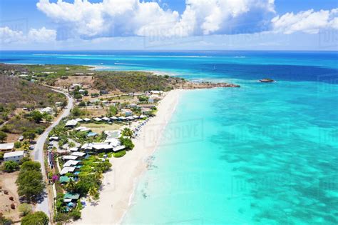 Aerial view by drone of tropical white sand of Turners Beach, Antigua ...