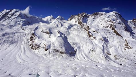 snow alps mountains and blue sky cloud 8575587 Stock Photo at Vecteezy