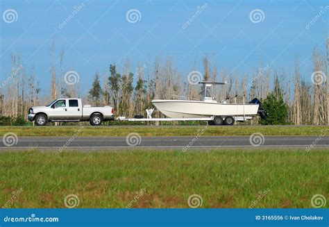 Pickup truck hauling boat stock photo. Image of duty, recreation - 3165556