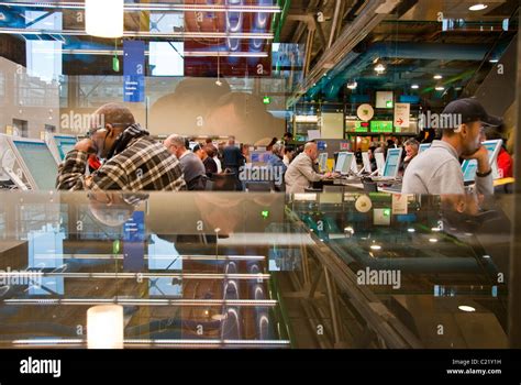 Paris, France, People sitting using computers, George Pompidou Center, Beaubourg, Inside Public ...