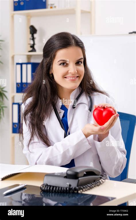 Female doctor cardiologist working in the clinic Stock Photo - Alamy