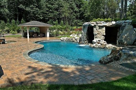 Swimming Pool Grotto Designs: Fun ‘Out’ of the Sun – The Deck and Patio ...