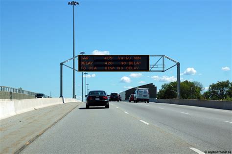 This overhead changeable message sign stands over the Niagara-bound lanes of the QEW at the ...