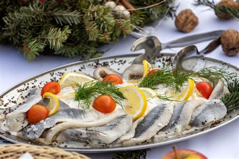 Marinated Herring Fillets in a Cream Sauce on a Plate Stock Image ...