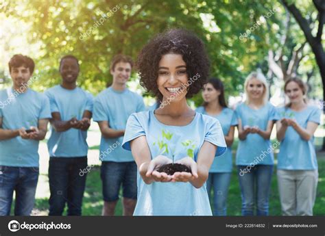 Group of volunteer with trees for growing Stock Photo by ©Milkos 222814832