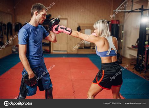 Pictures: female kickboxer | Female Kickboxer Workout Male Personal Trainer Pads Gym Interior ...