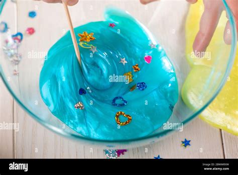 Slime mixing hi-res stock photography and images - Alamy