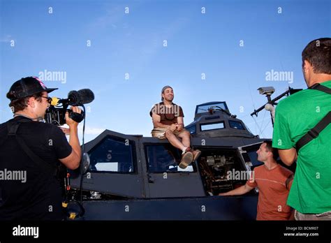 Storm Chaser and IMAX videographer Sean Casey sits on TIV during ...