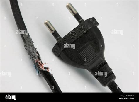 Frayed electrical cord Stock Photo - Alamy