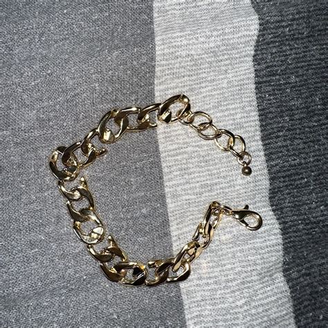 Gold plated chain link bracelet Used - in good... - Depop