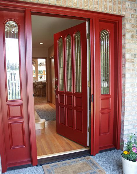 Red Front Door and Bold House Exterior - Traba Homes