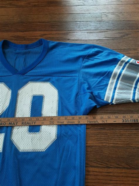 Vintage 90s NFL DET LIONS Barry Sanders Jersey Made By Champion - BIDSTITCH