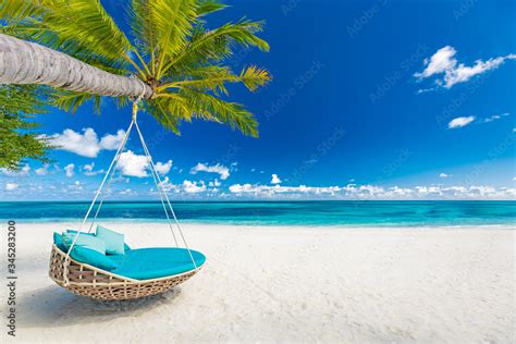 Tropical beach paradise as summer landscape with beach swing or hammock ...