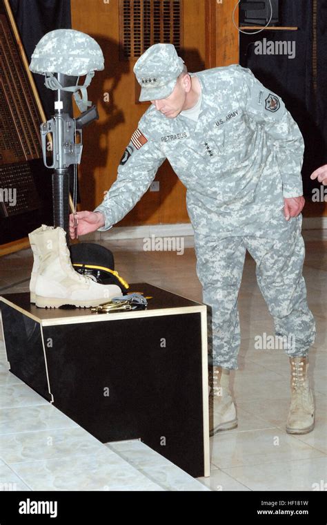 Gen. David Petraeus, commanding general of Multi-National Force – Iraq, pays his respects to ...