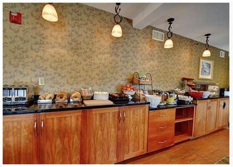 Breakfast area at the Clarion Inn. | Breakfast area, Liquor cabinet ...