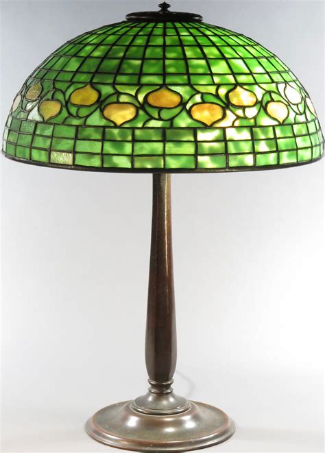 Description: This vintage Tiffany Studios, New York table lamp depicts ...