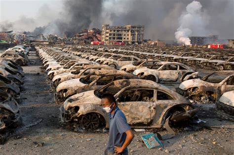 Firefighter rescued from blast zone in China's Tianjin port - US News